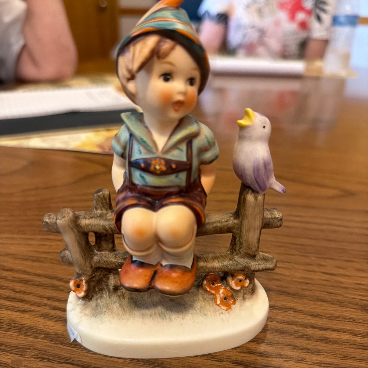 M.I. Hummel Goebel Figurine Boy Sitting on Fence with Bird - Bavarian Style Collectible